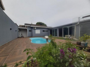 Casa com piscina no Portal